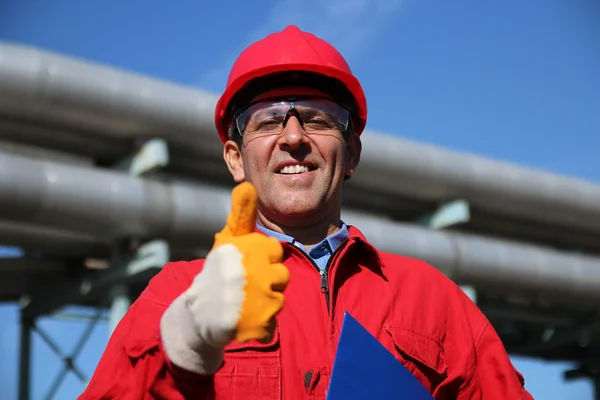 Smiling Industrial Worker Giving Thumb Up