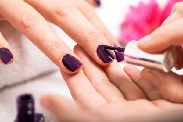 Nail manicure in a beauty salon