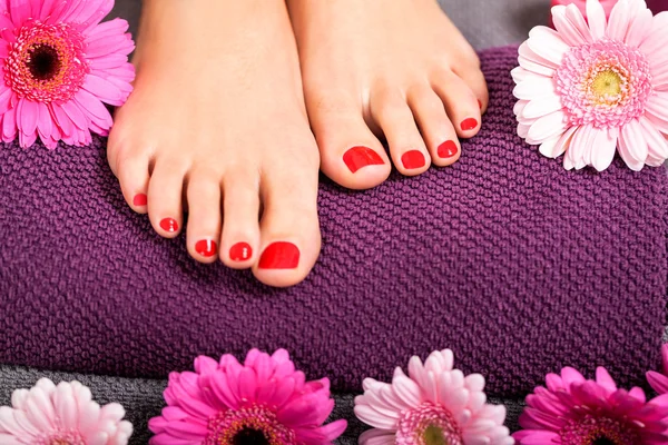 Bare feet with flowers