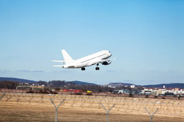 Passenger airliner taking off at an airport