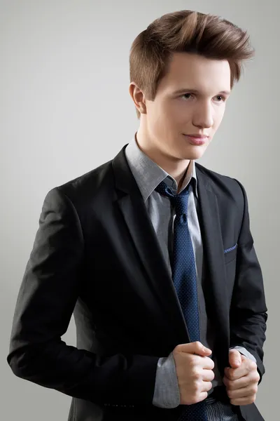 Short Hair Style. Portrait of young man with brown hair