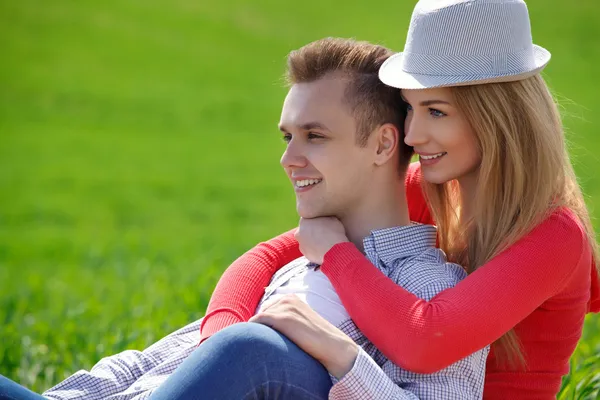 Portrait of attractive young couple in love outdoors. Love and f