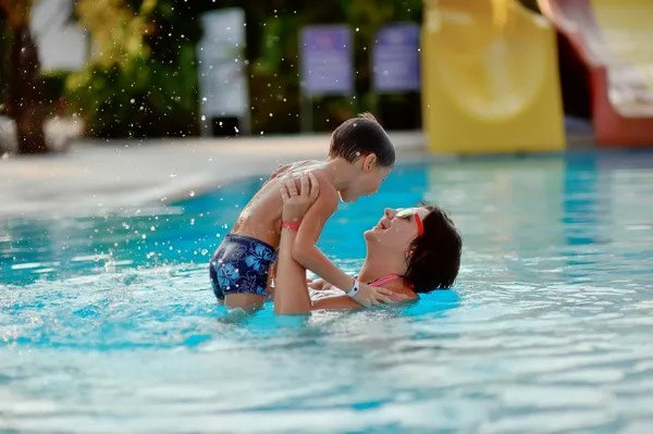 Mom and son in the pool