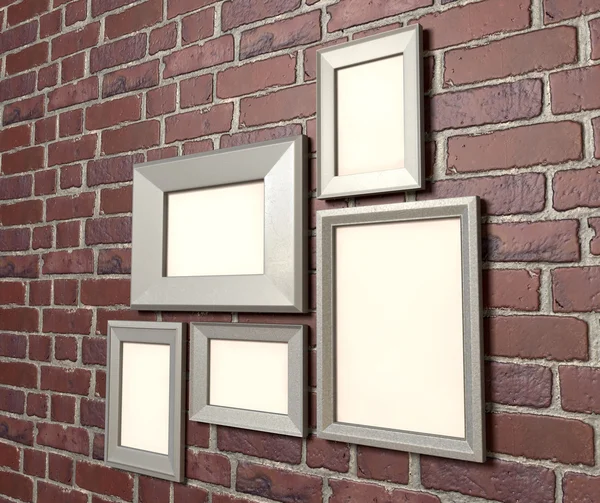 Blank Picture Frames On A Wall Perspective