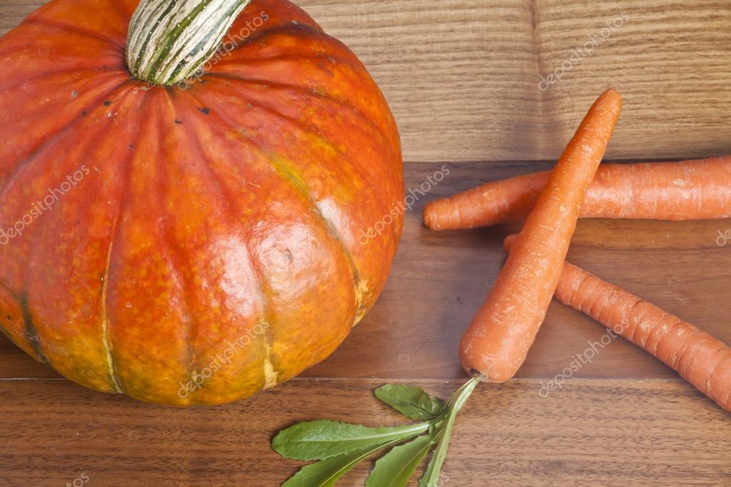 Pumpkin and carrots — Stock Photo © _Ra_ 43962801