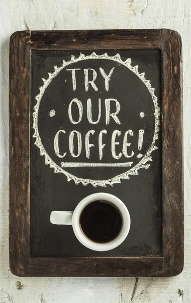 Poster with coffee cup on blackboard