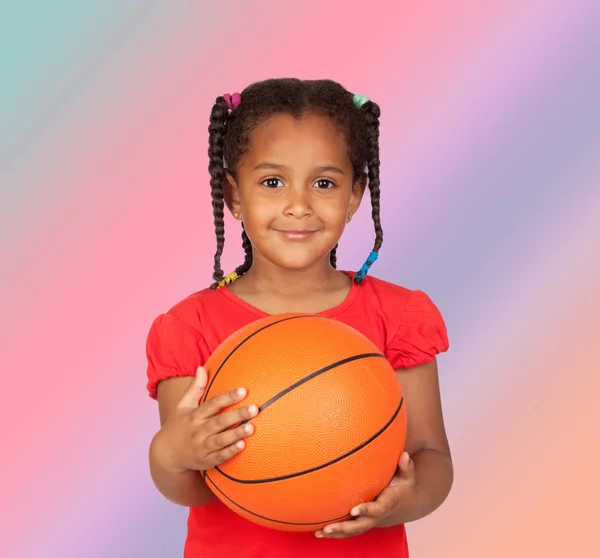 African little girl with a basket ball