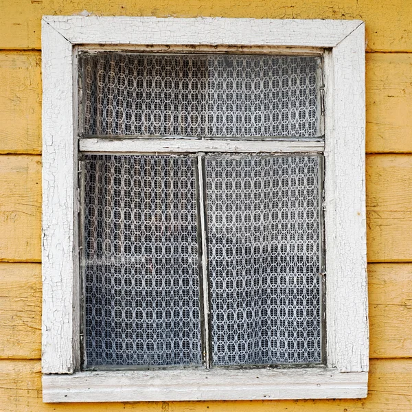 Old wooden wall with window
