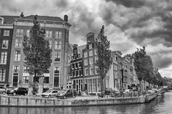 BW photo of Amsterdam canal.
