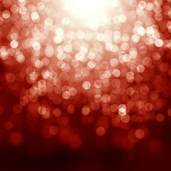 Red christmas background with defocused lights