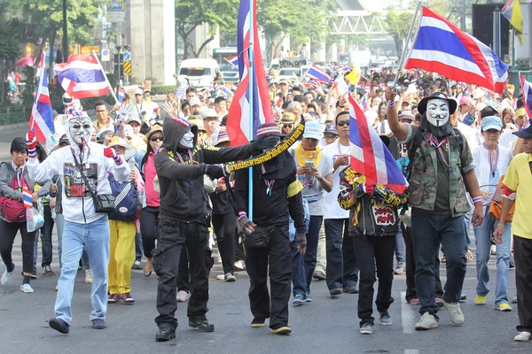 BANGKOK - DEC 9: Many Masked protesters walked for anti governme
