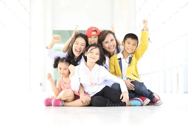 Group lovely kids funny and smile with two adults women
