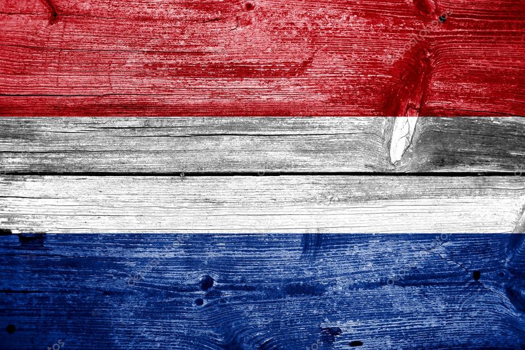 Netherlands Flag painted on old wood plank background — Stock Photo 