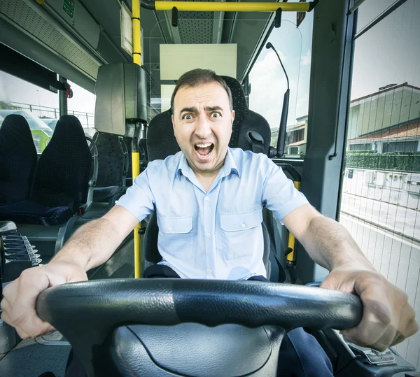 Bus driver with scared face.