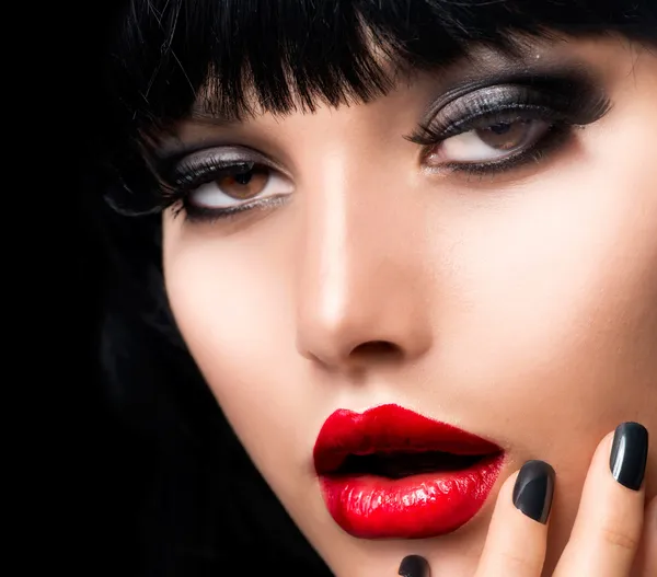 Beautiful Brunette Girl Portrait. Face. Makeup. Sensual Red Lips
