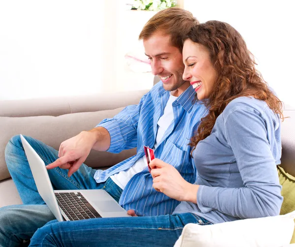 Online Shopping. Couple Using Credit Card to Internet Shop