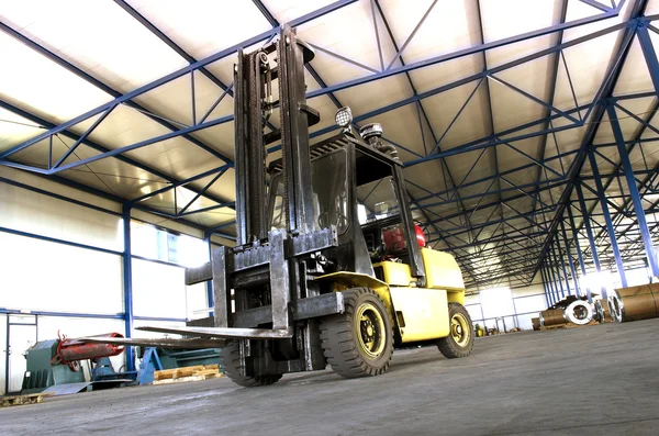 Forklift in production hall