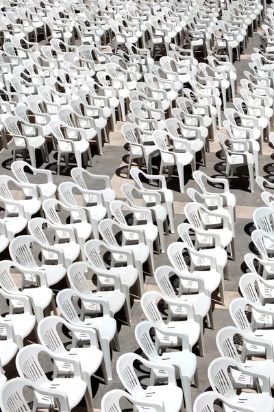 Rows of chairs for outdoor dehors alfresco bar and live gig conc