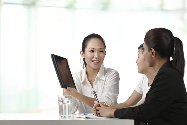 Asian Business woman with a Digital Tablet