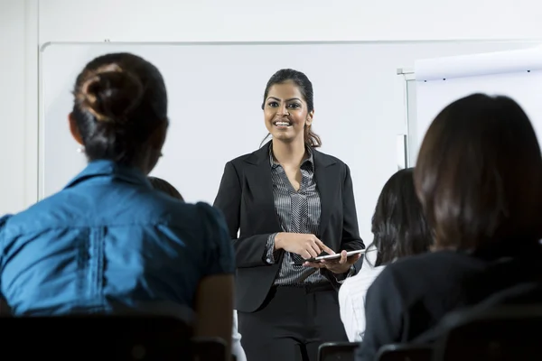 Indian business woman giving presentation