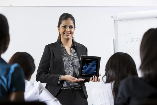 Indian Business woman giving presentation.