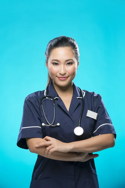 Portrait of a happy Asian Female Nurse