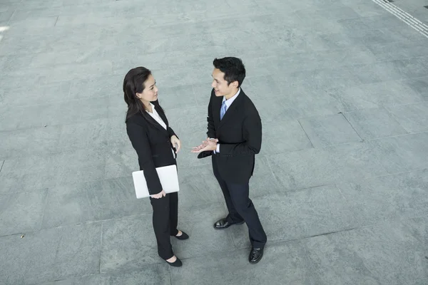 Above view of Asian Business people talking to each other.