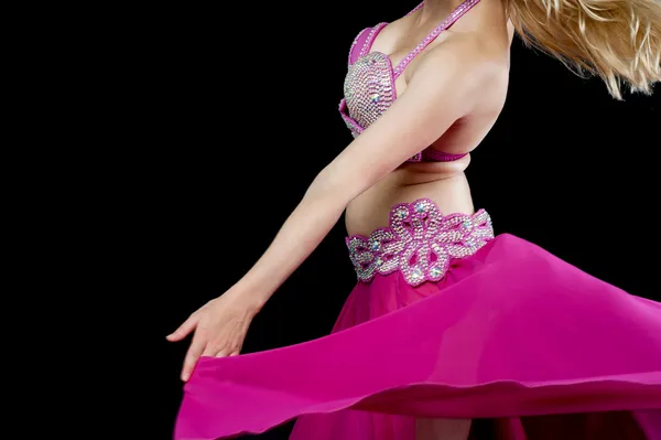 Belly dancer in action, cropped image.