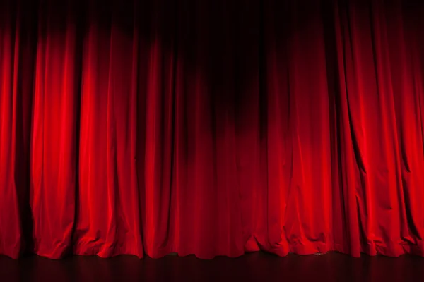 Curtain from the theatre with a spotlight