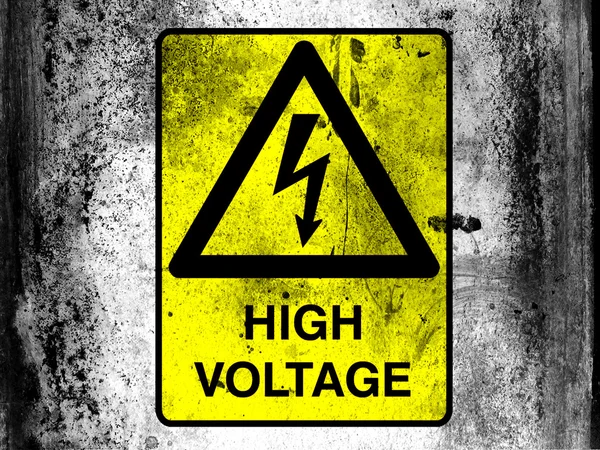 High voltage sign drawn at board with grungy dirty stains all over it