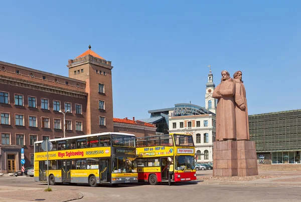 Yellow city sightseeing buses in Riga, Latvia