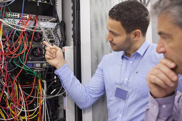 Technicians fixing wires