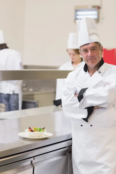 Smiling chef with his salad