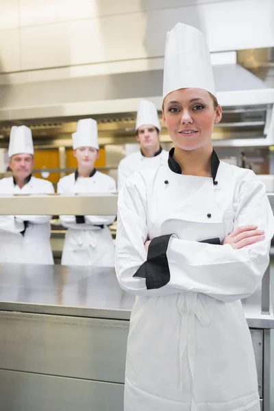 Smiling chef with crossed arms