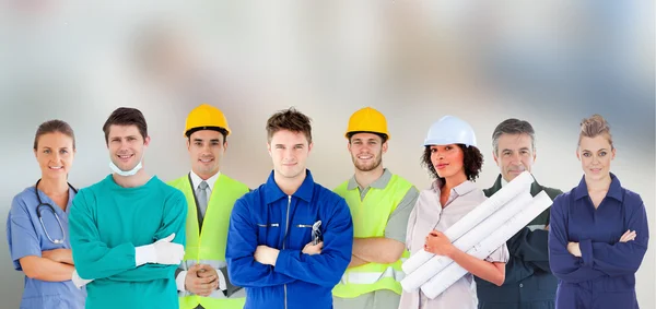 Group of with different jobs standing