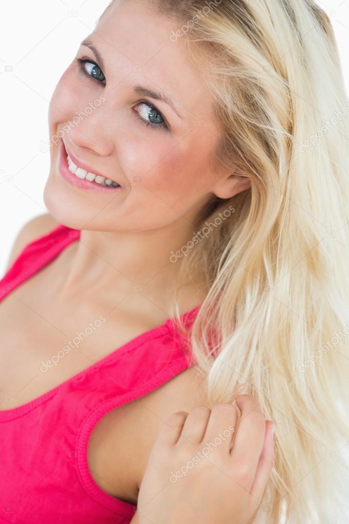 Portrait Of Beautiful Woman With Blue Eyes And Blonde Hair Stock Portrait Of Beautiful Young Woman With Blue Eyes And Blonde Hair Over White Background Photo By Wavebreakmedia