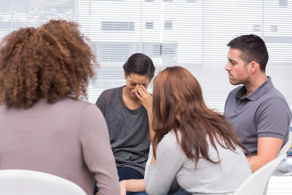 Patient crying during a group session