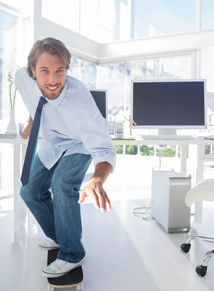 Employee skating through his office