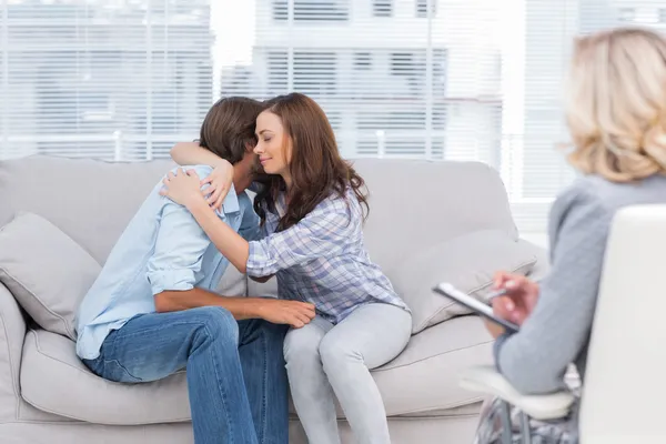 Couple reaching break through in therapy session