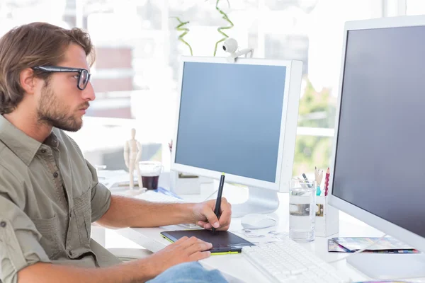 Graphic artist using graphics tablet