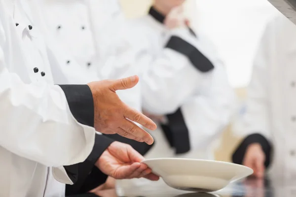 Head chef showing class a bowl