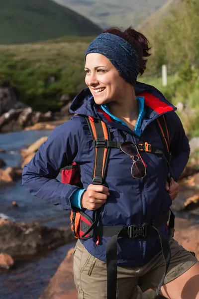 Happy brunette on a hike