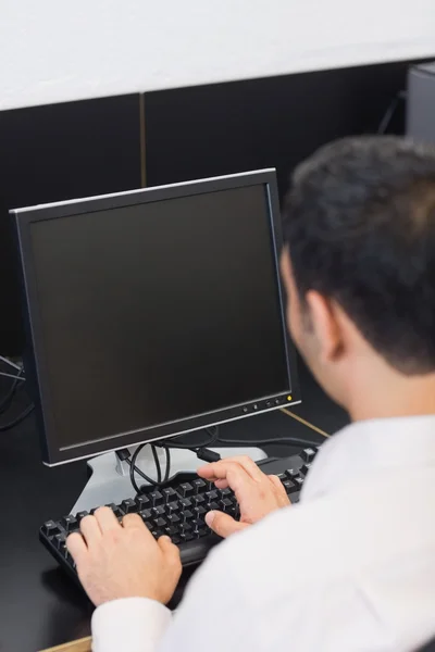 Mature student in computer room