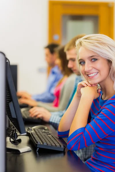 Students using computers in the computer room