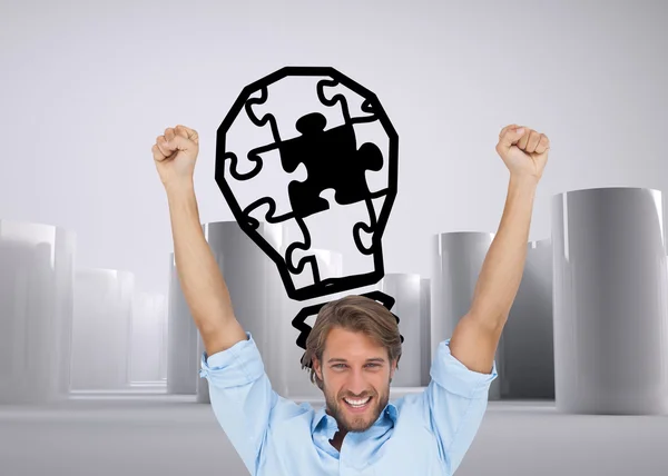 Happy man celebrating success with arms up