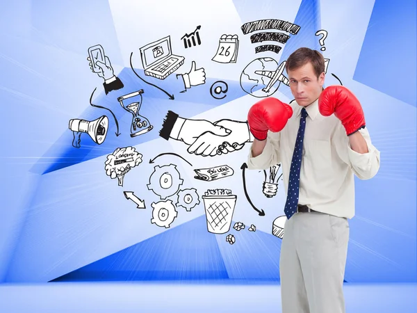 Businessman with his boxing gloves ready to fight