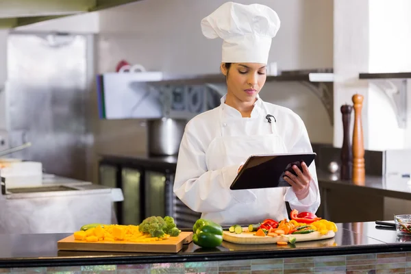 Chef using digital tablet