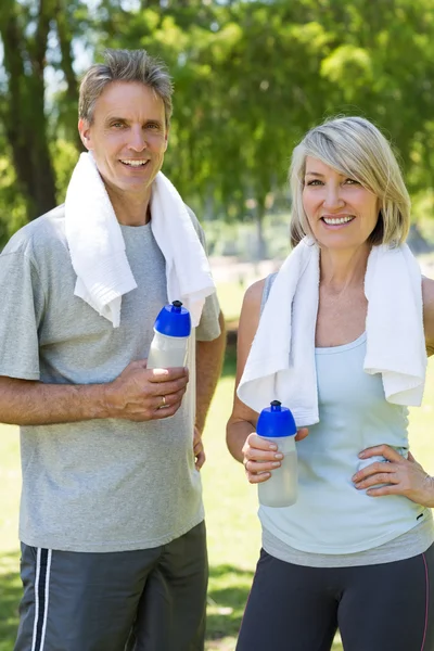 Happy couple after a workout in park