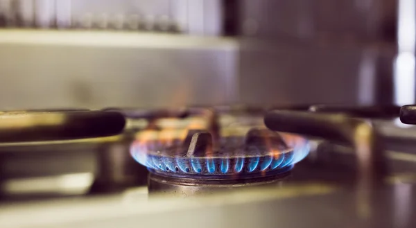 Burning gas on kitchen