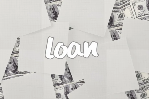 Loan against white paper strewn over dollar bills